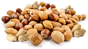 A pile of various nuts in their shells